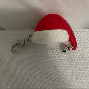 Bath & body works Santa hat hand sanitizer holder
Red and white Christmas Hat